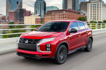 Red 2024 Mitsubishi Outlander Sport Driving on Road