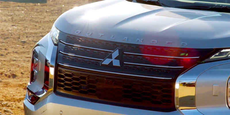 The emblem of a 2024 Mitsubishi Outlander near San Jose, CA 