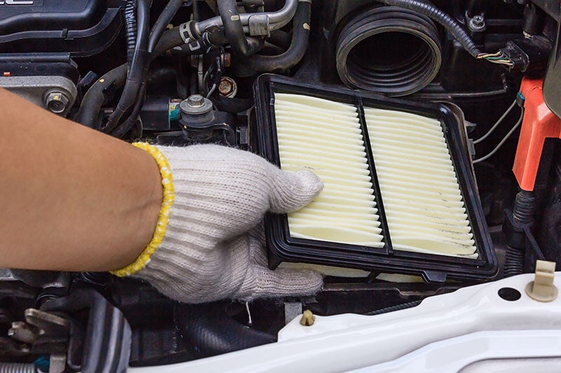 Routine maintenance being done on a Mitsubishi vehicle near San Jose, CA 